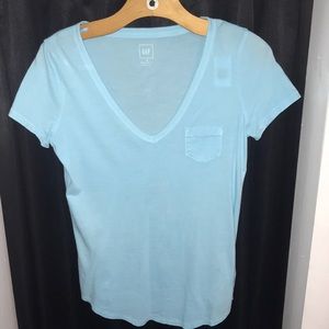 Light blue V-neck